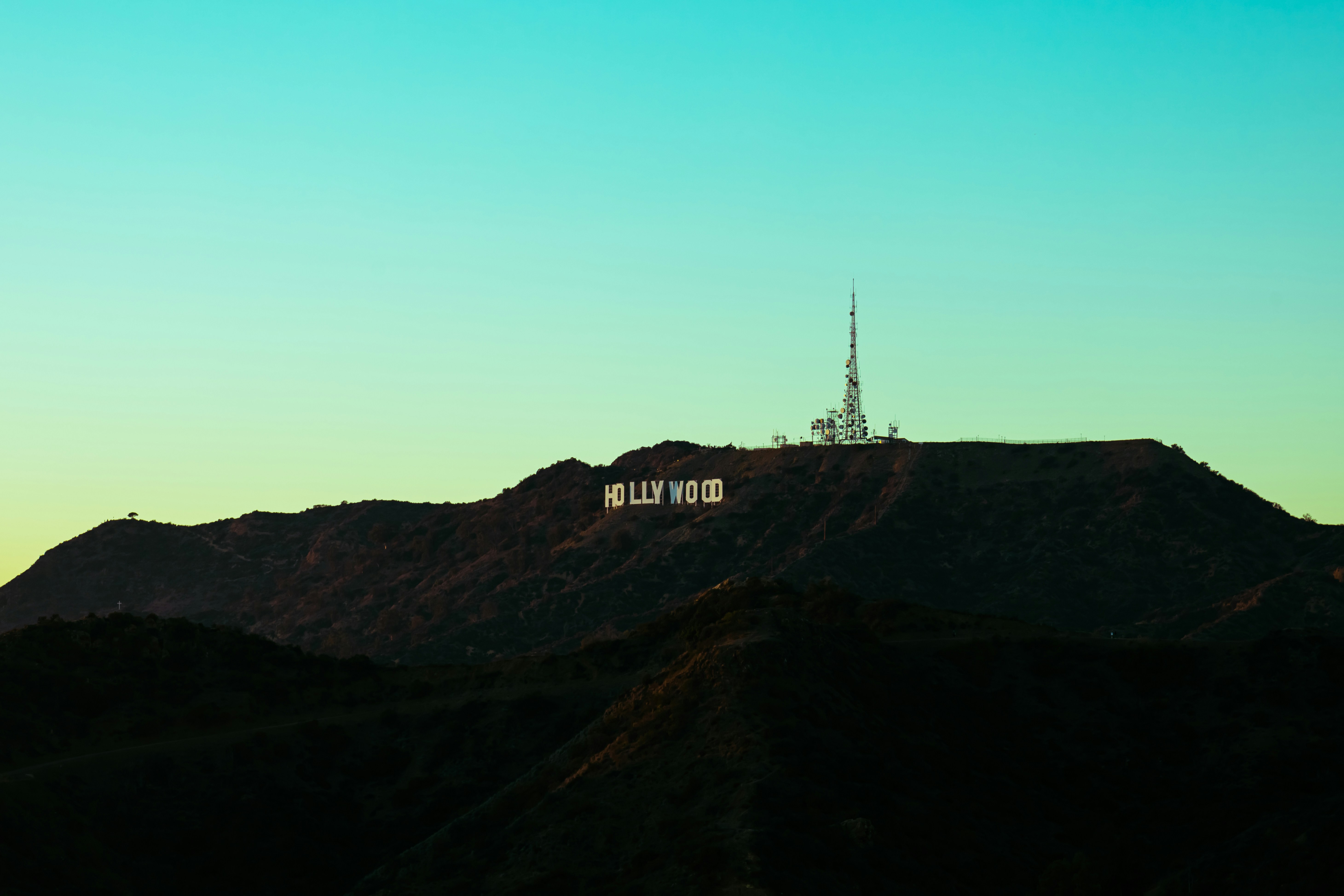 a hill with a radio tower on top of it
