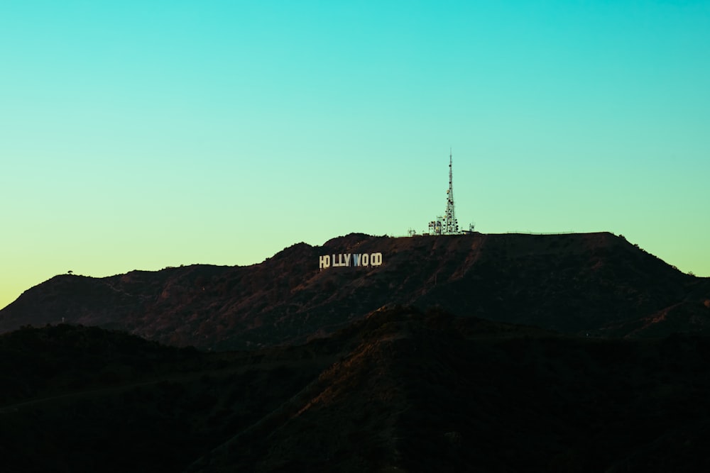 a hill with a radio tower on top of it