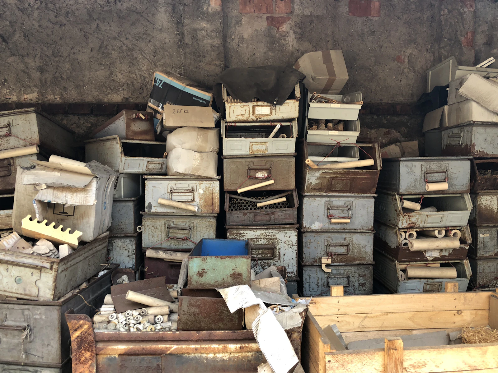 A pile of boxes and boxes sitting next to each other