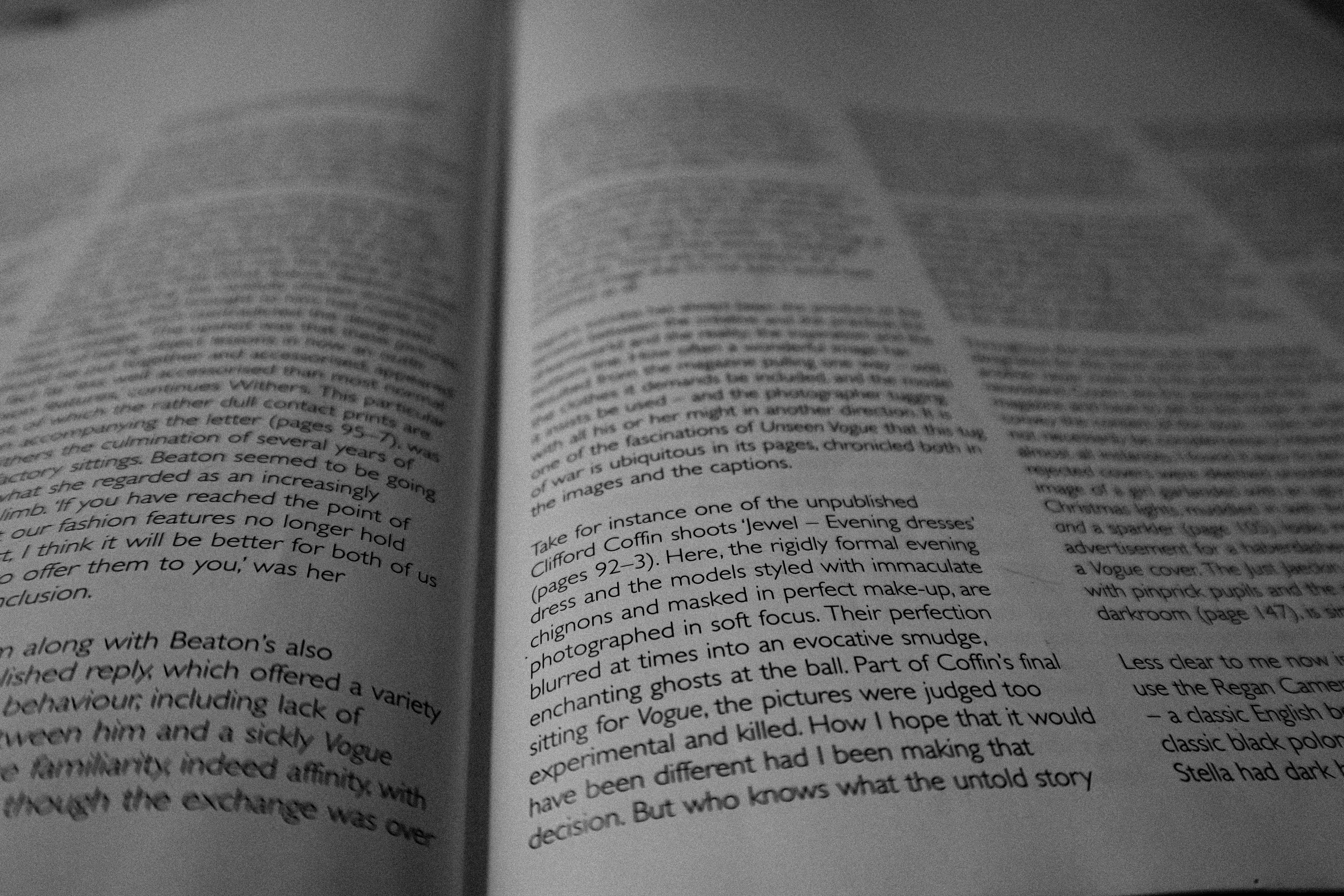 a close up of an open book on a table