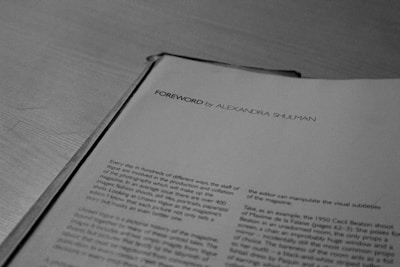 a close up of an open book on a table