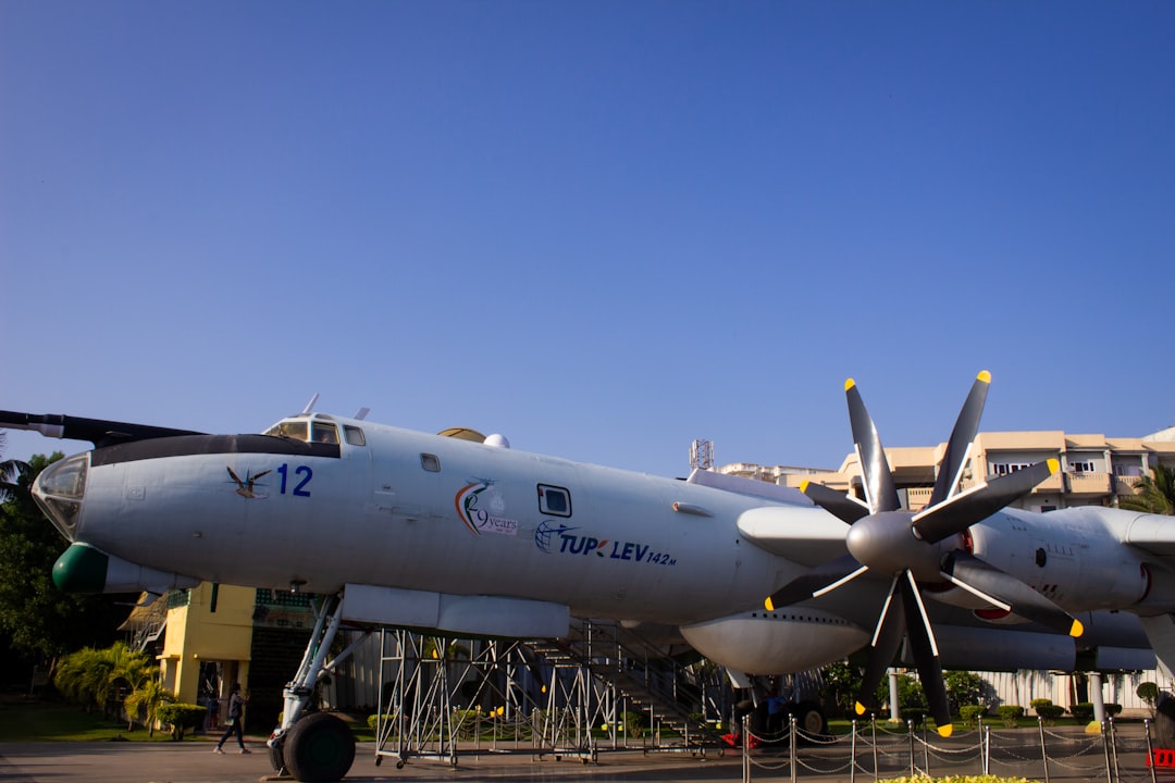 a large air plane sitting on top of a tarmac,