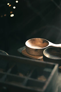 The product displayed on a rustic wooden table with soft natural light