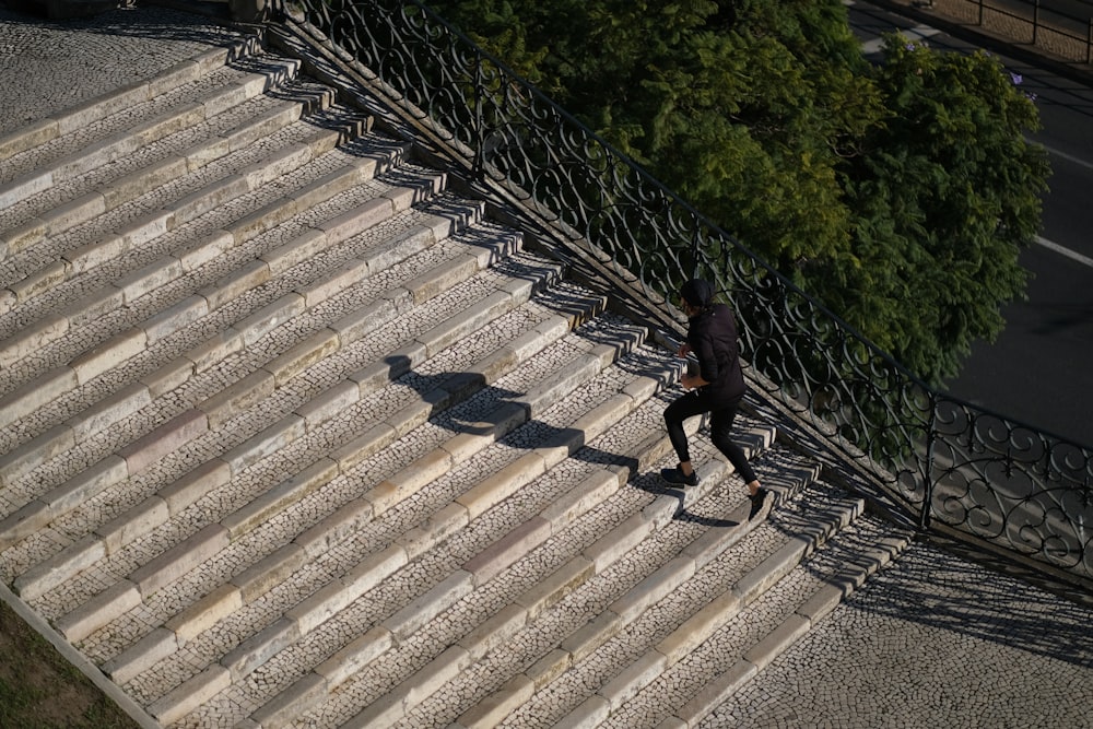 a man walking down a flight of stairs