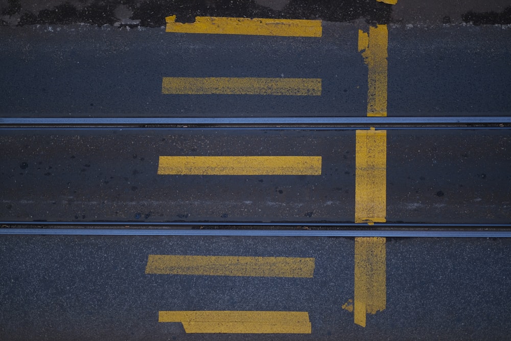 a street with yellow lines painted on it