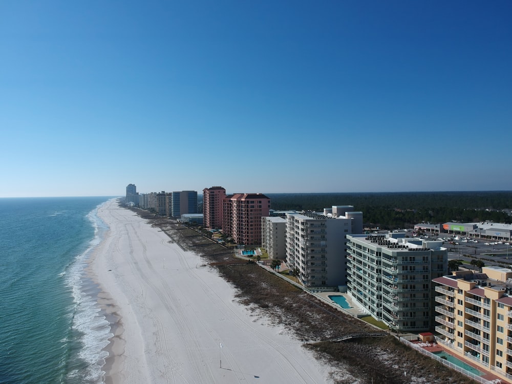 an aerial view of a beach and a city