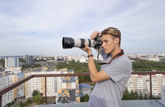 a man taking a picture with a camera