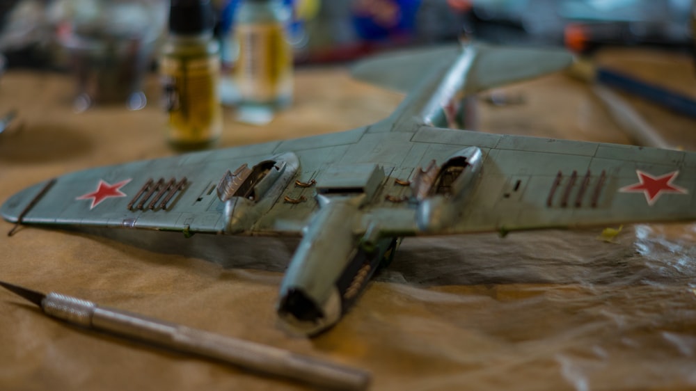 a model airplane sitting on top of a table
