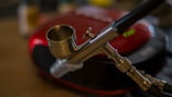 a close up of a metal object on a table
