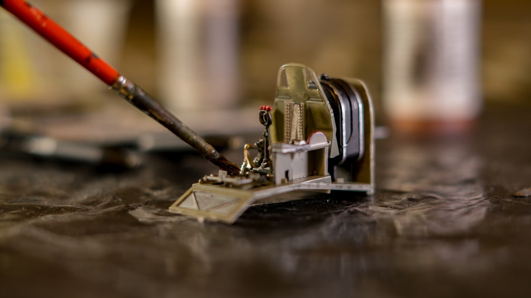 a close up of a miniature machine on a table