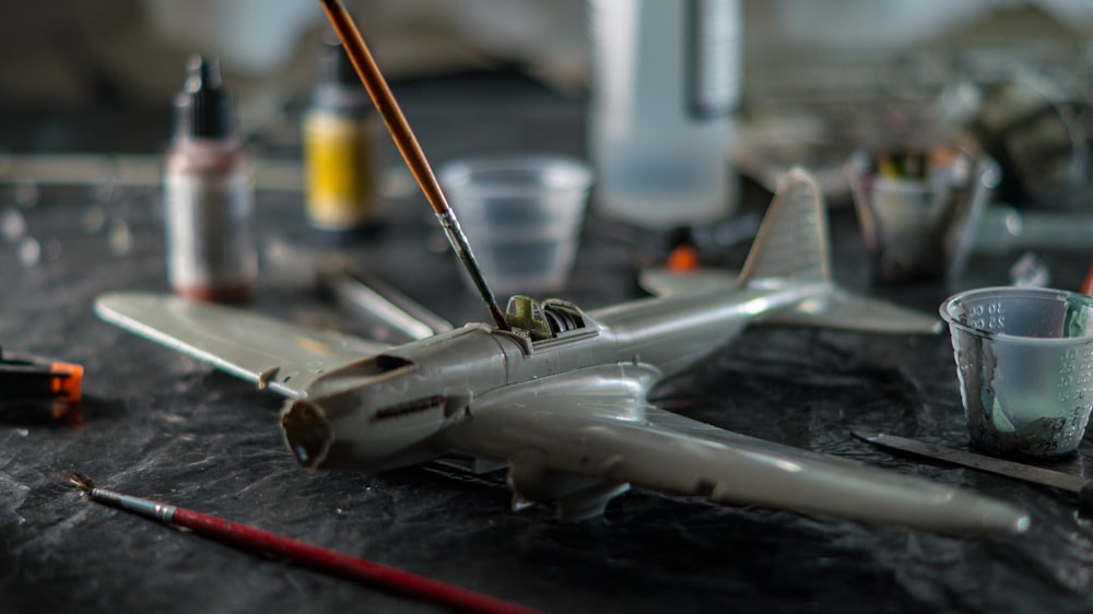 a model airplane sitting on top of a table
