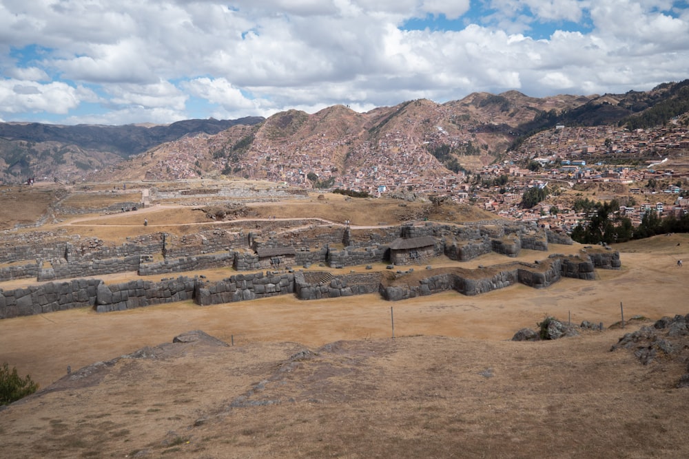 a view of a city from the top of a hill