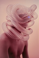 a woman's head is shown with a spiral design on it