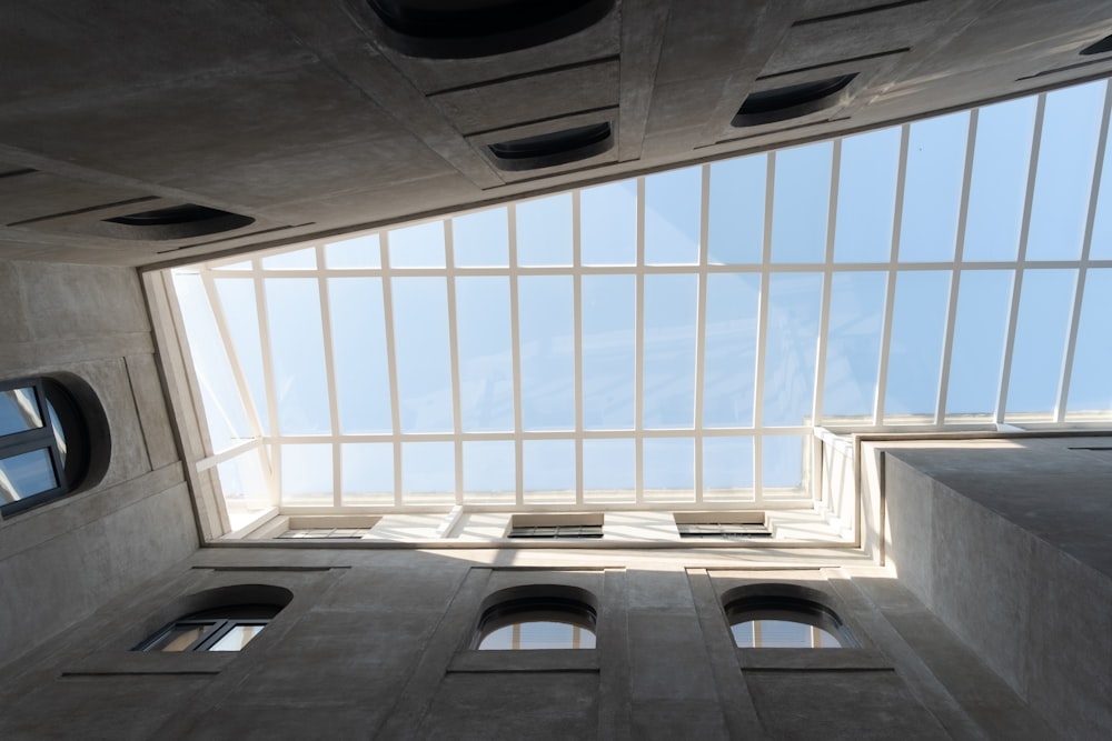 looking up at the sky from the inside of a building