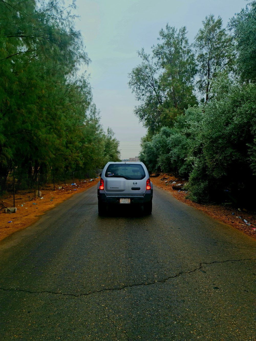 a car is parked on the side of the road