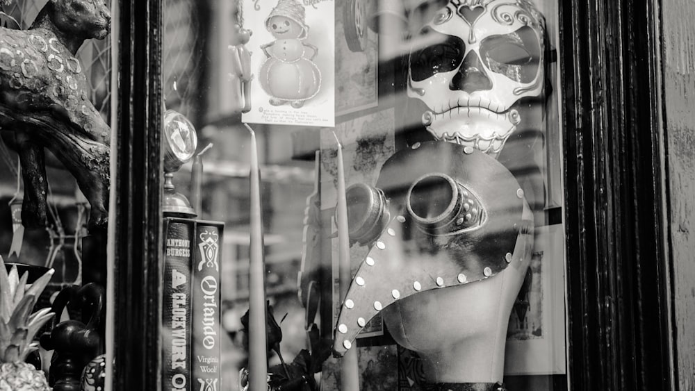 a black and white photo of a window display