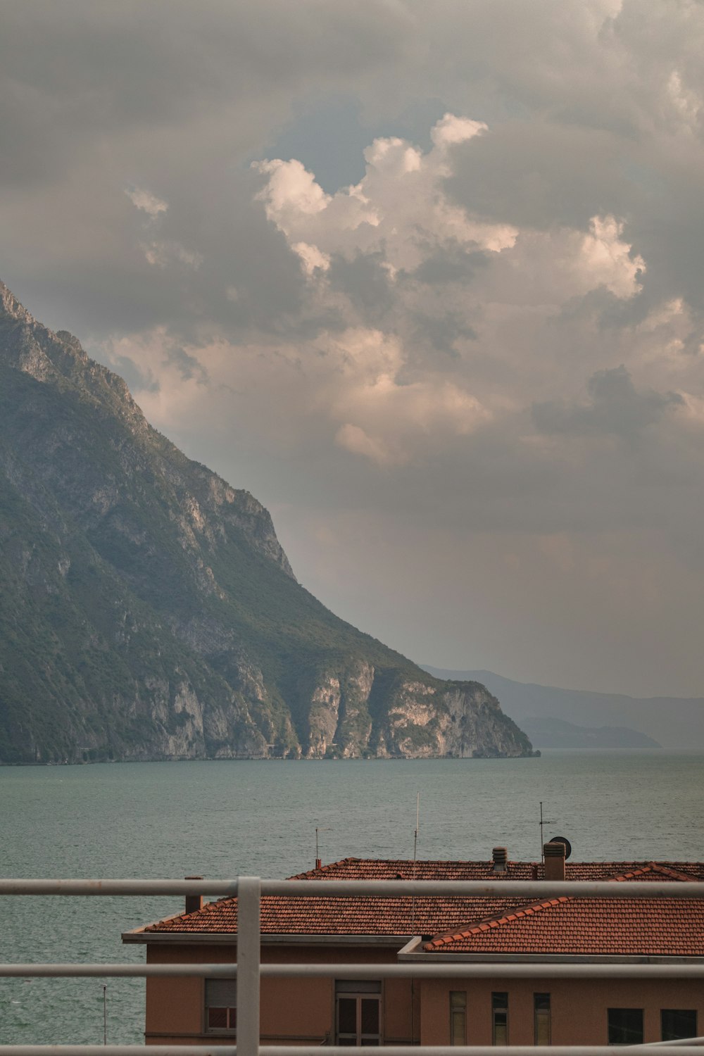 a view of a body of water with a mountain in the background