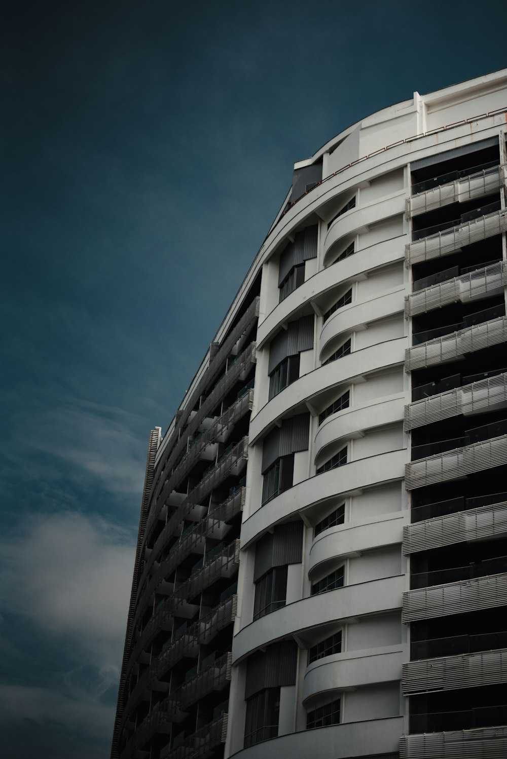 a tall building with a clock on the top of it