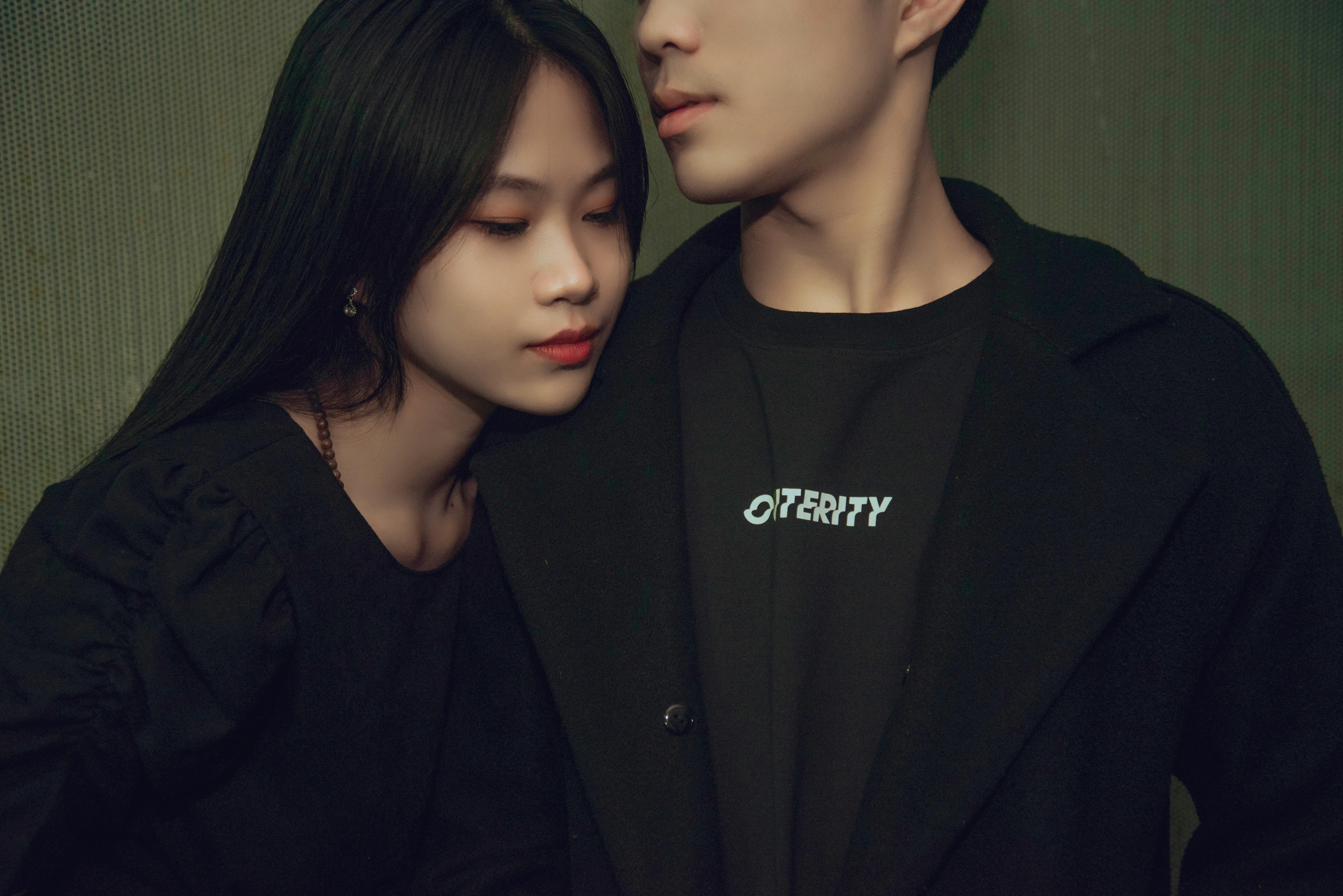 a man and a woman standing next to each other