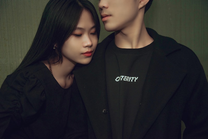 a man and a woman standing next to each other