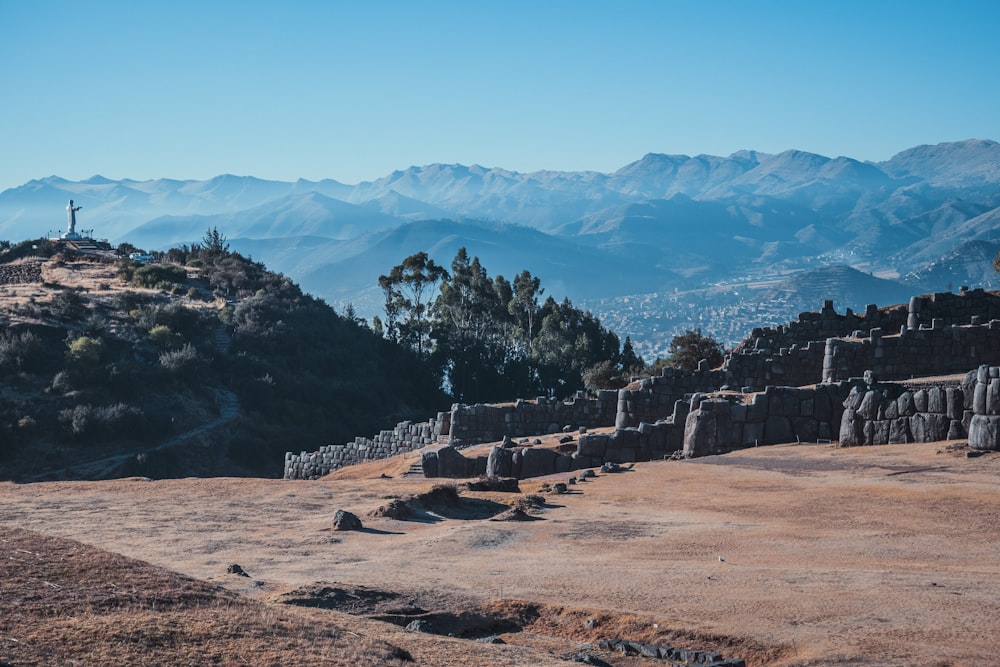 a view of a mountain range with mountains in the background