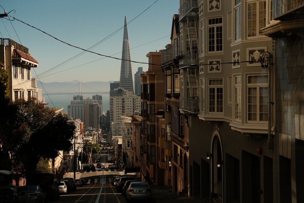 a view of a city with a steeple in the background