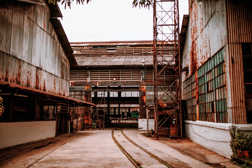 an old factory building with scaffolding on the side of it