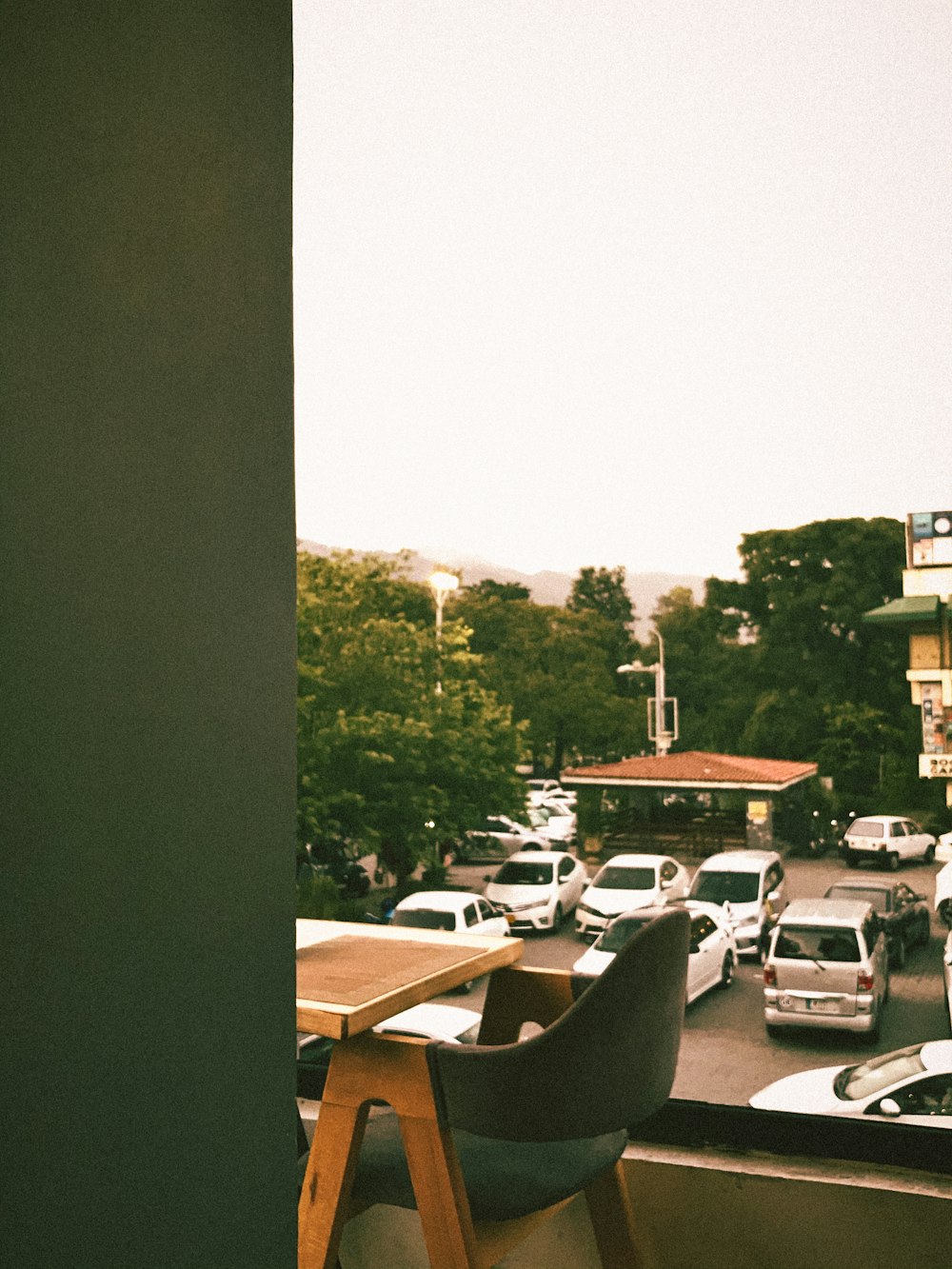 a view of a city street from a balcony