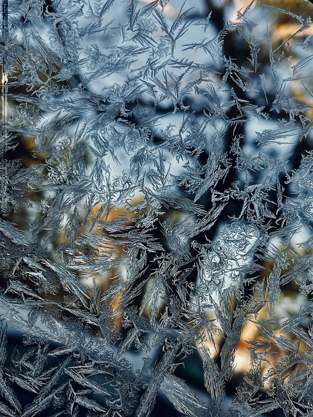 a close up of a window with ice on it