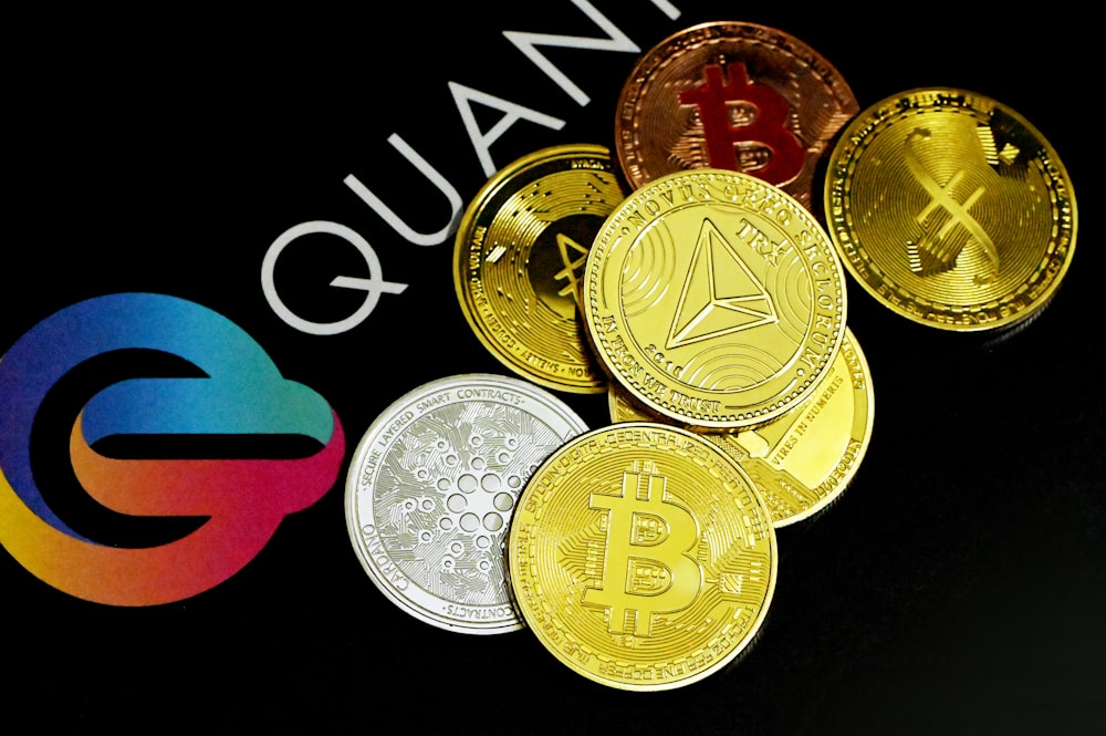 a pile of coins sitting next to a qantas logo