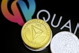 a close up of two coins on a table