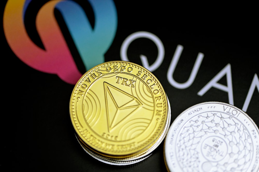 a close up of two coins on a table