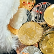 a pile of bitcoins with a santa hat on top of it