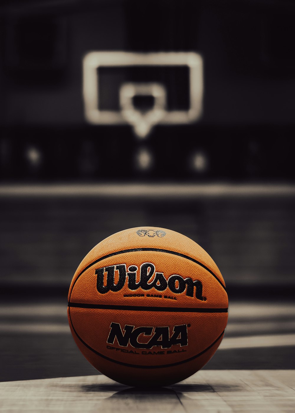 a close up of a basketball on a court