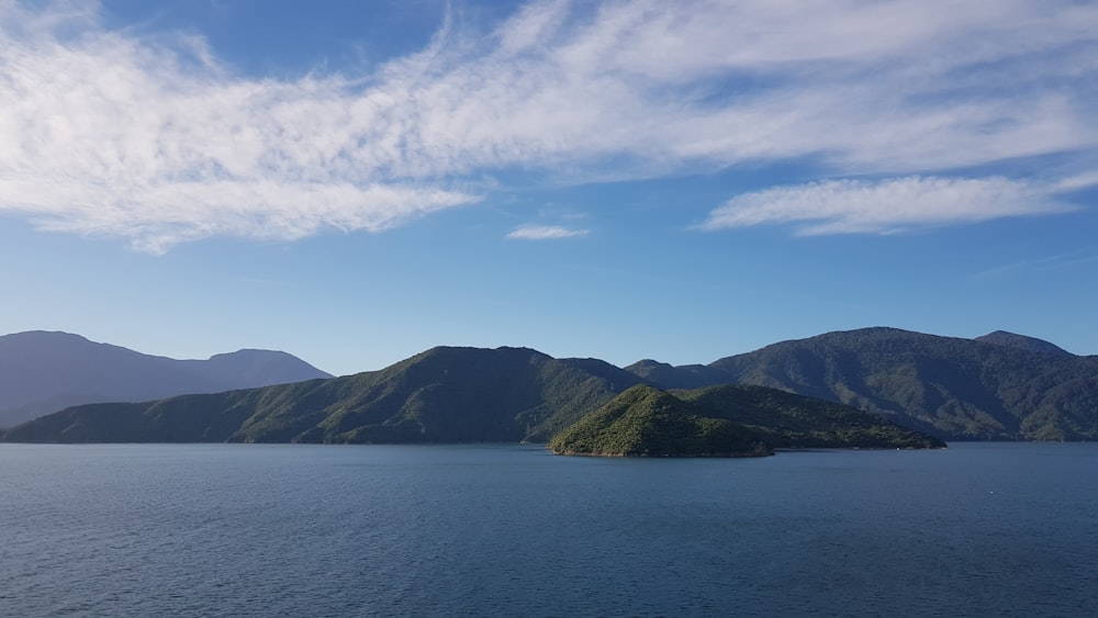 a large body of water surrounded by mountains