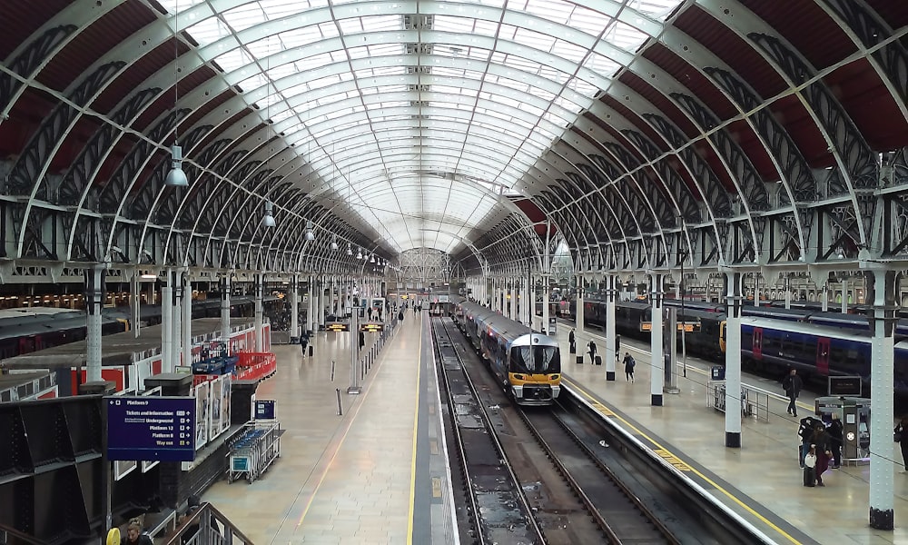 a train station with a train on the tracks