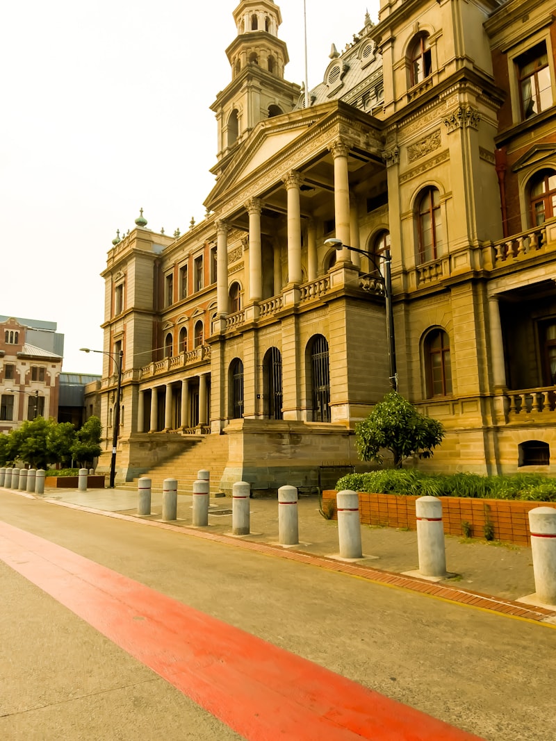 A large building with a clock tower in Pretoria, South Africa