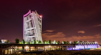 A high-rise building at sunset with enhanced lighting and sharp details.