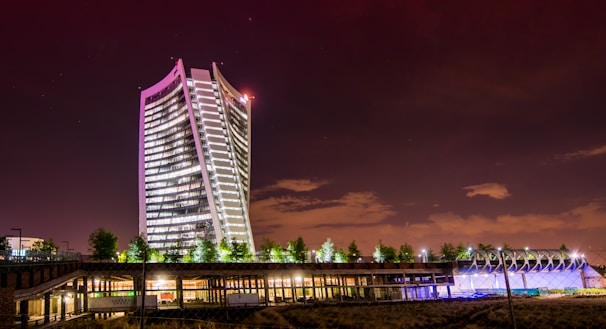 A high-rise building at sunset with enhanced lighting and sharp details.