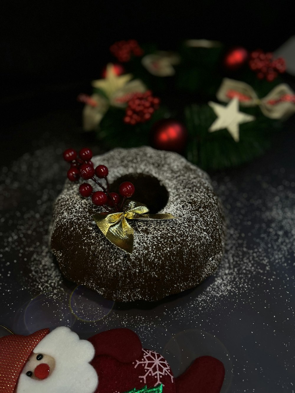 a chocolate bundt cake with a christmas decoration