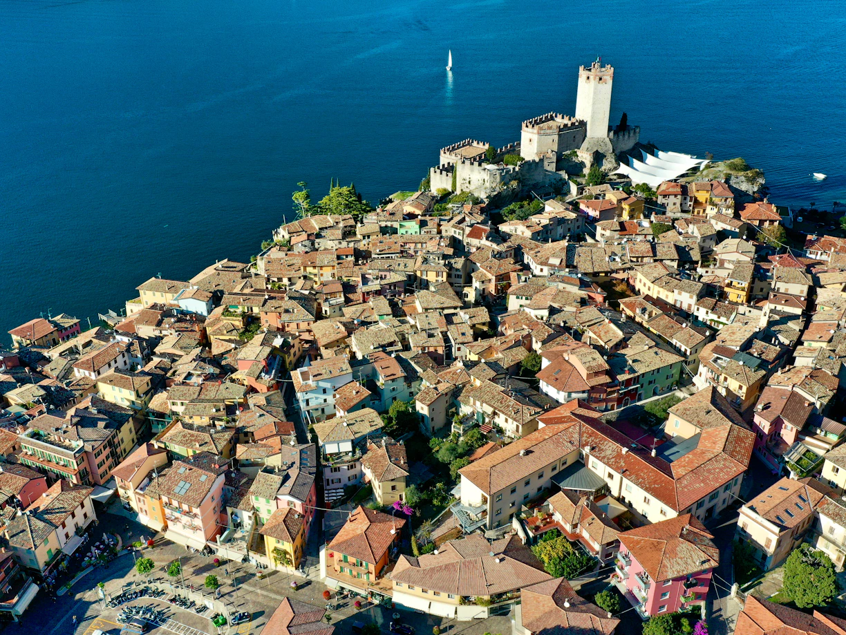 Castle and village on a hill overlooking the water
