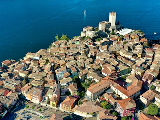 Castle and village on a hill overlooking the water