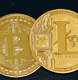 a close up of a gold bit coin
