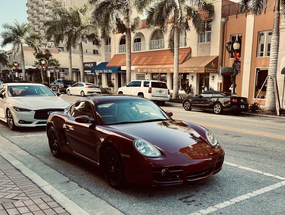 a red sports car parked on the side of the road