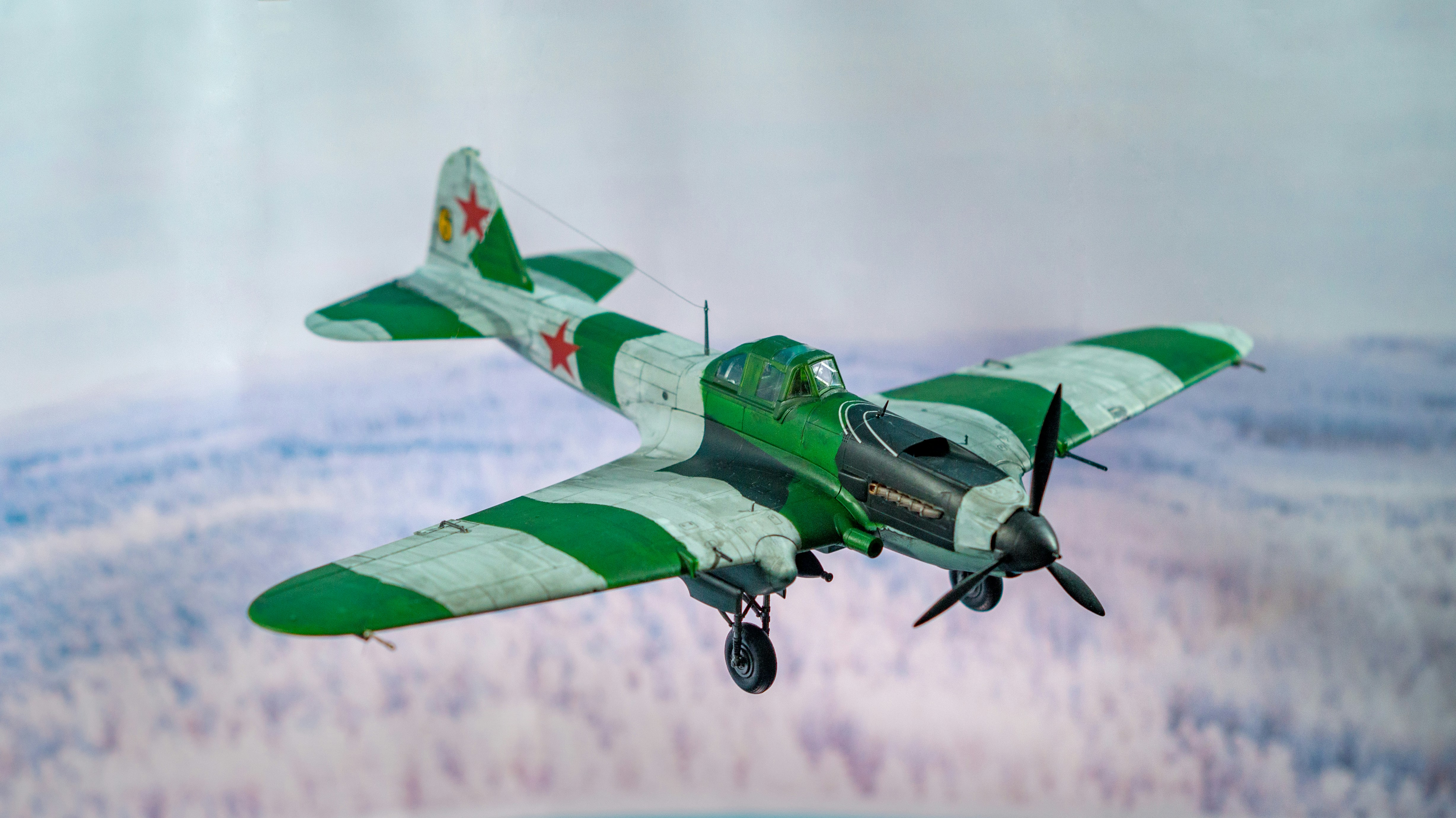My IL2 Sturmovik in 1:48 from Revell with winter camouflage.The IL2 is probably the most famous aircraft of the Red Army in World War II - and with over 36,000 units it is also the most frequently built. The main task of this aircraft was to combat armored vehicles. The Soviets themselves called it \
