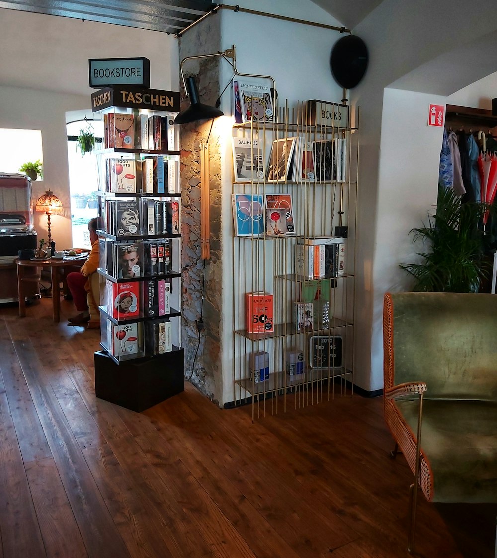 a room with a lot of books on the shelves