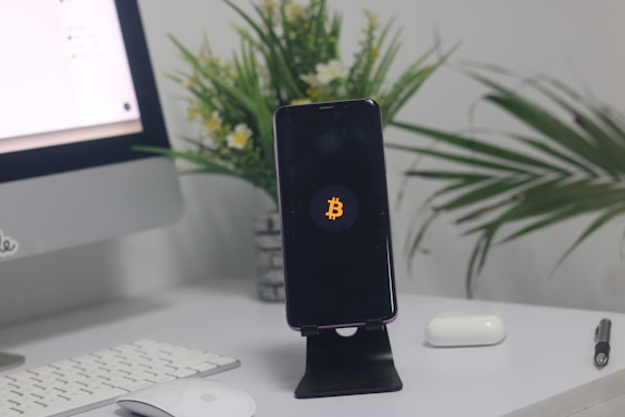 A friendly customer service representative wearing a headset, ready to assist with bitcoin miner accessories inquiries.