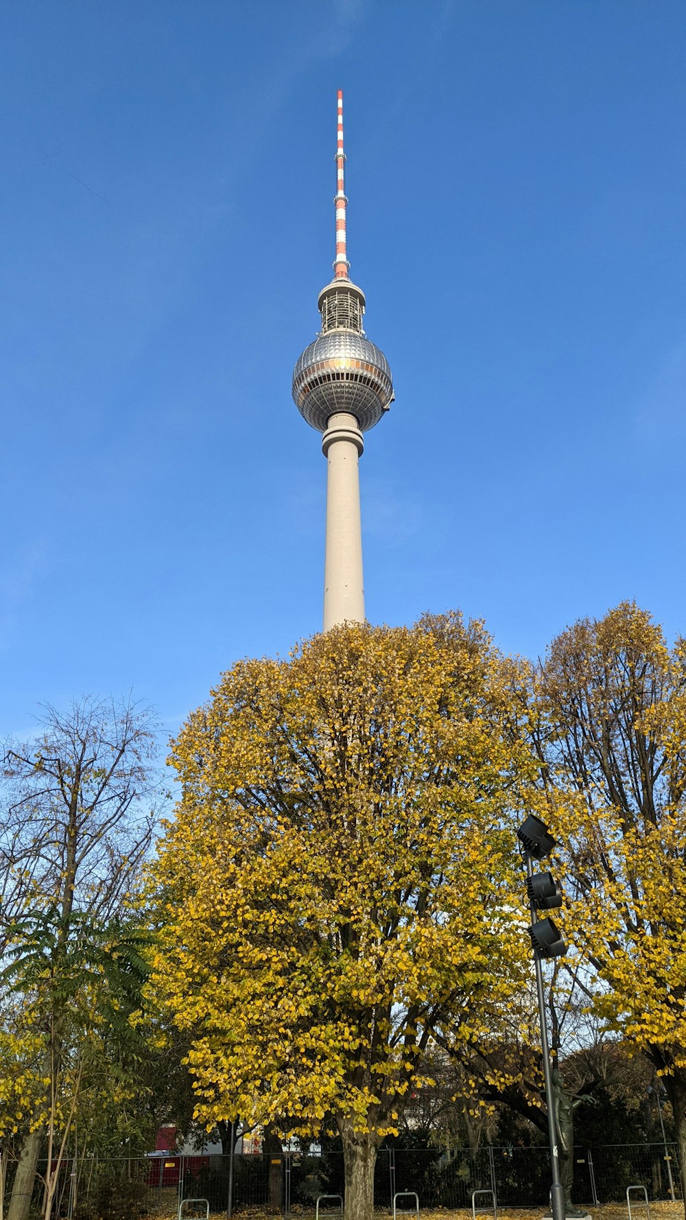 a tall tower with a sky scraper on top of it