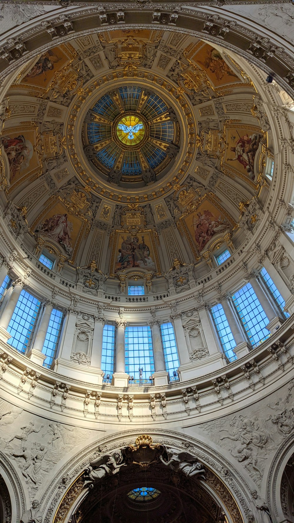 a domed ceiling with a stained glass window