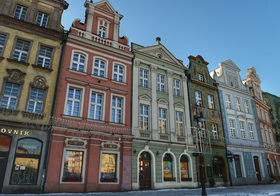 Painted houses above the shops — Poznań, Poland